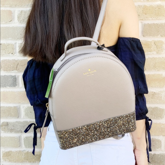 kate spade Handbags - Gaby’sBags👜💕- Kate Spade Glitter Backpack Gray